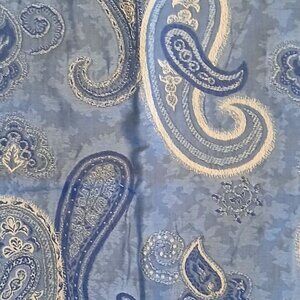 Paisley design in a stunning array of blue hues, crafted from a luxurious blend